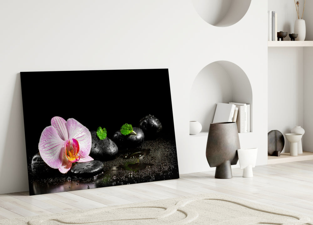 Spa glass wall art styled above a bathtub in a tranquil bathroom