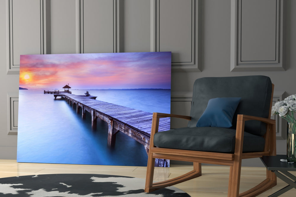 Dock artwork anchoring a reading corner with sunset calm