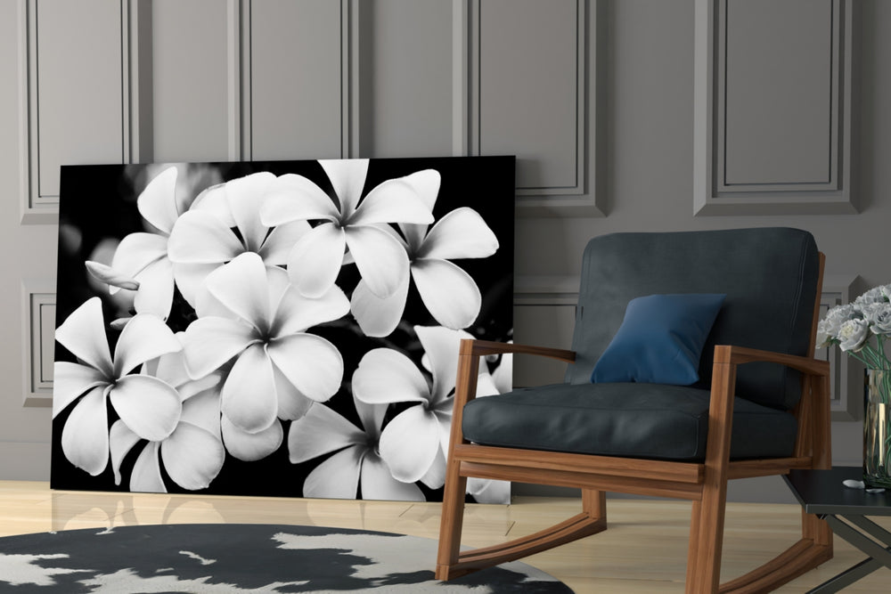 Flower artwork anchoring a dining area with elegant mood