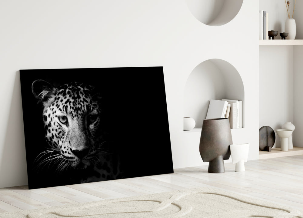 Leopard glass wall art styled above a desk in a focused home office