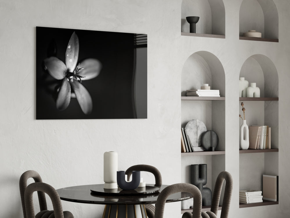 Flower glass print enhancing a bathroom with minimalist dark mood