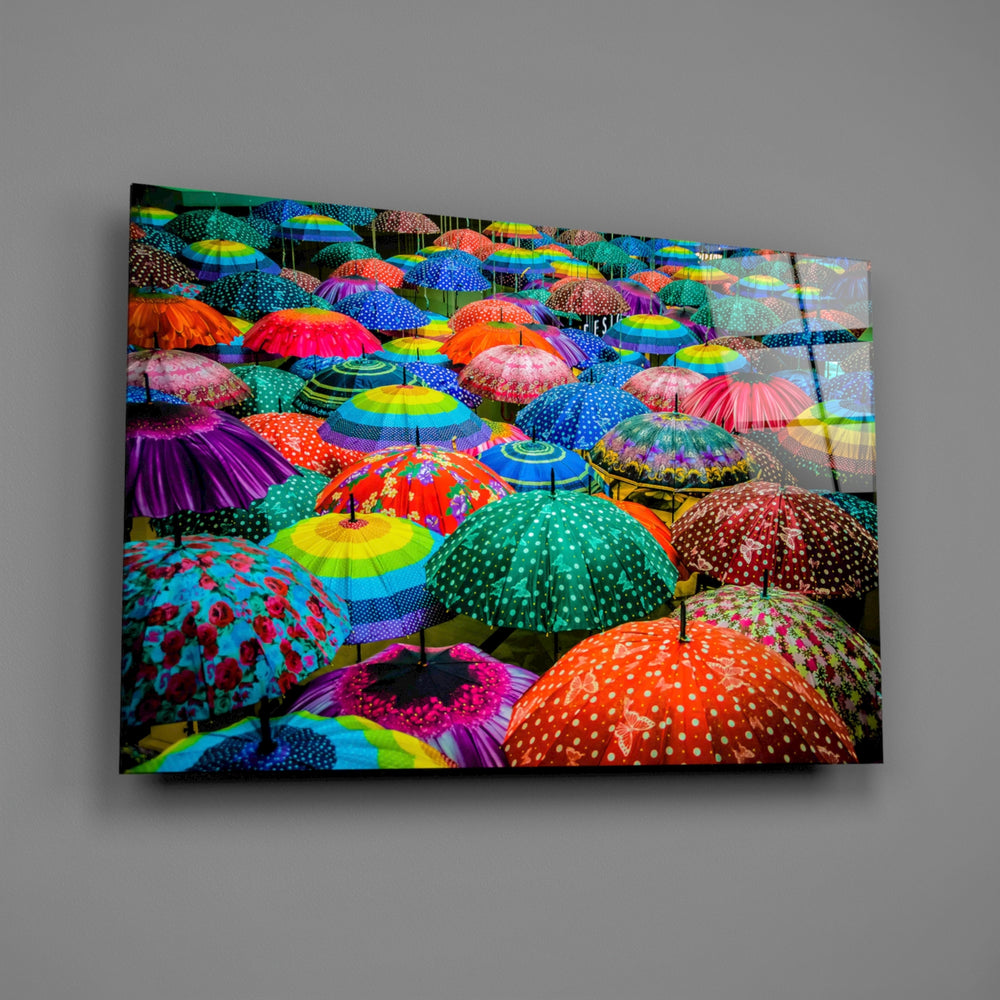 Close-up detail of overlapping multicolor umbrellas from above