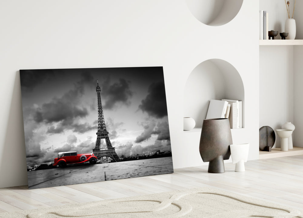 Eiffel Tower glass wall art styled above a sofa in a literary living room