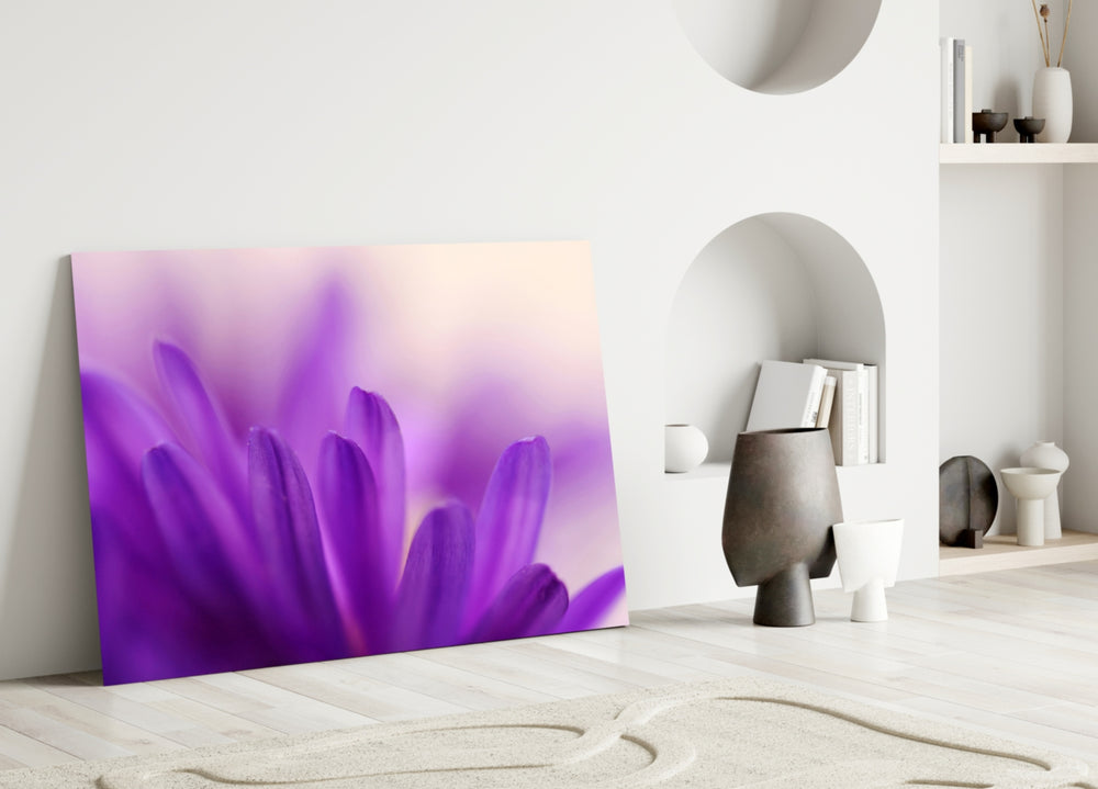 Flower glass wall art styled above a bed in a feminine pastel bedroom