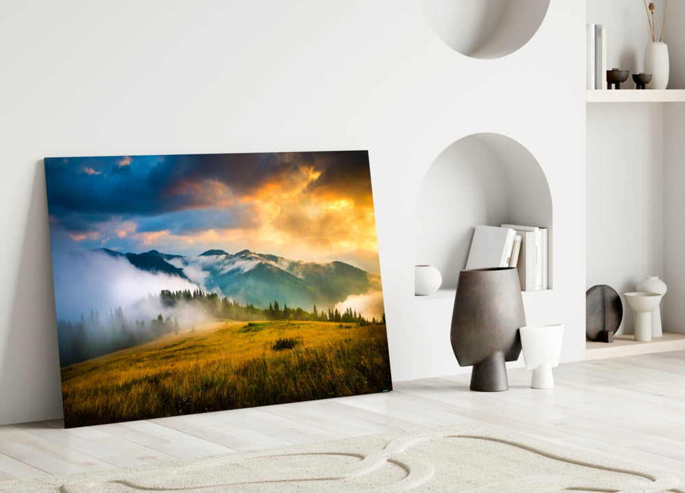 Mountain glass wall art styled above a sofa in an open living room