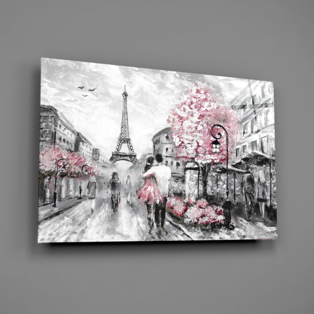 Close-up detail of pink blossoms over a Paris street with the Eiffel Tower