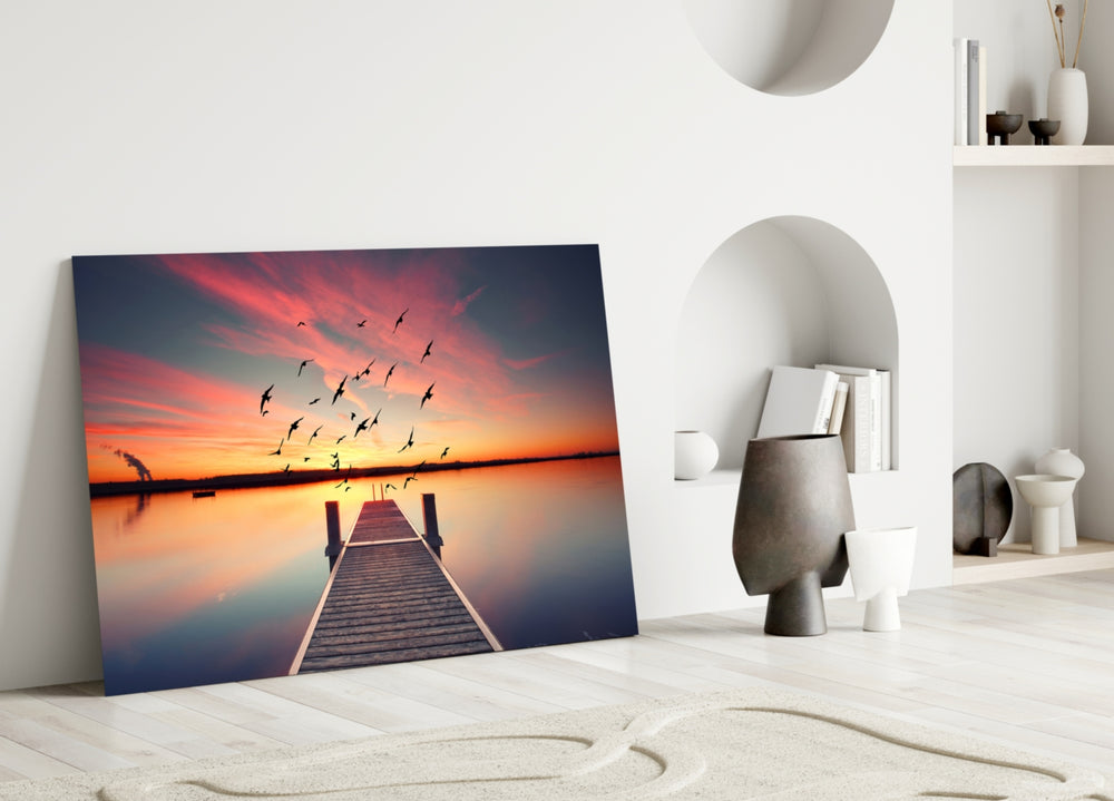 Dock glass wall art styled above a bed in a rich evening bedroom