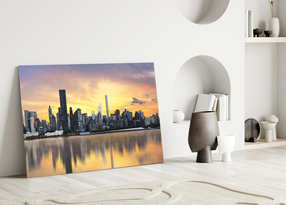 Downtown glass wall art styled above a sofa in a modern loft