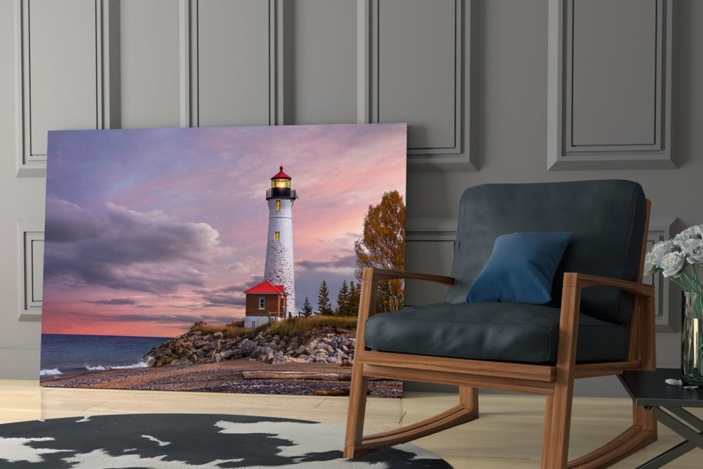 Lighthouse artwork anchoring a reading corner with coastal calm