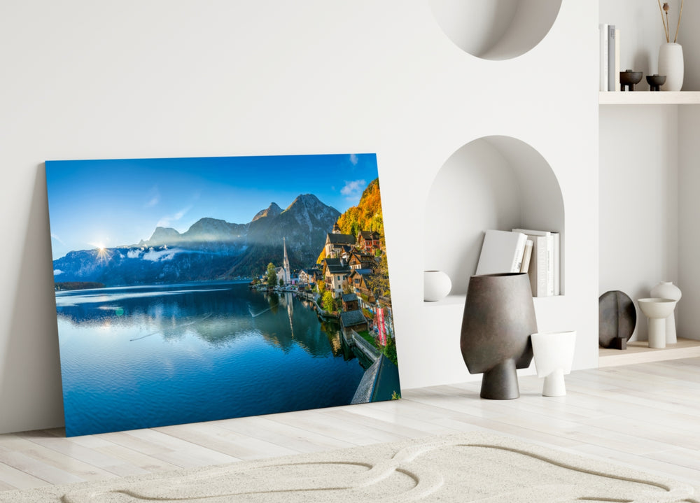 Lake glass wall art styled above a sofa in a travel-inspired living room
