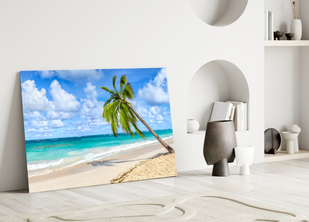 Holiday glass wall art styled above a bed in a beach-mood bedroom