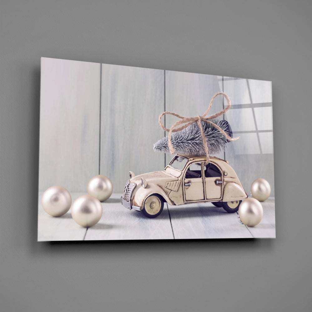 Close-up detail of the toy car with Christmas tree and pearl ornaments