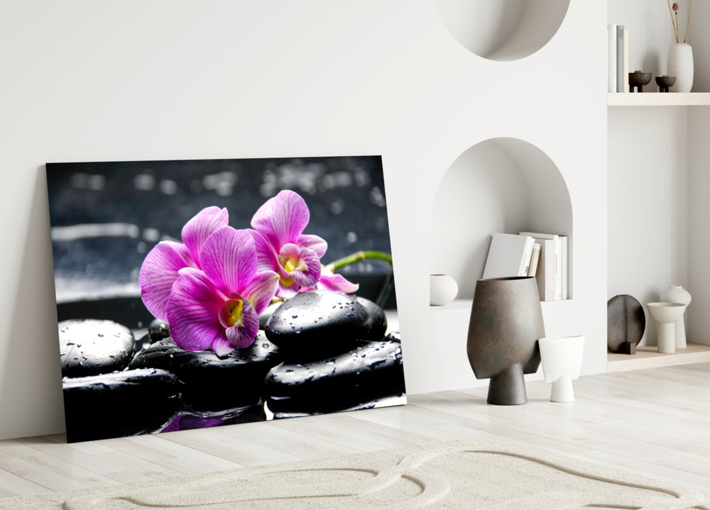 Spa glass wall art styled above a bathtub in a tranquil bathroom