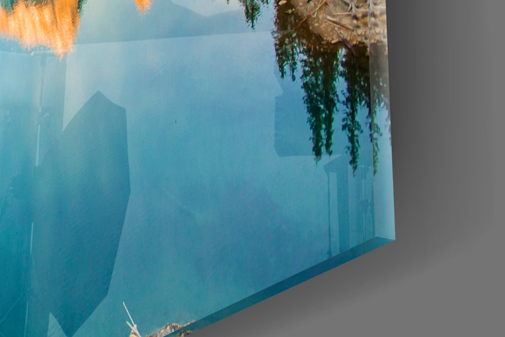 Lake artwork anchoring an office with wilderness mood