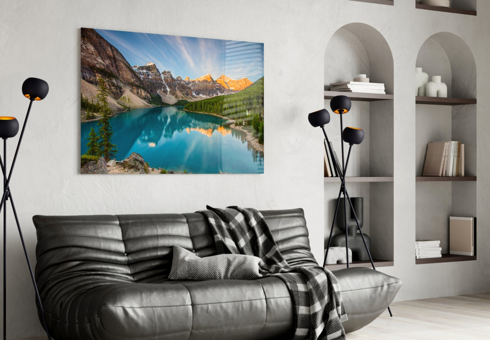 Lake glass wall art styled above a sofa in a travel-inspired living room