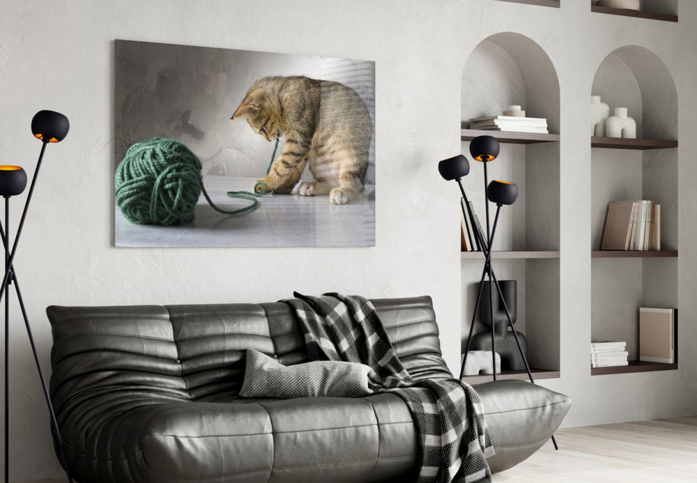 Cat glass wall art styled above a bed in a child's bedroom