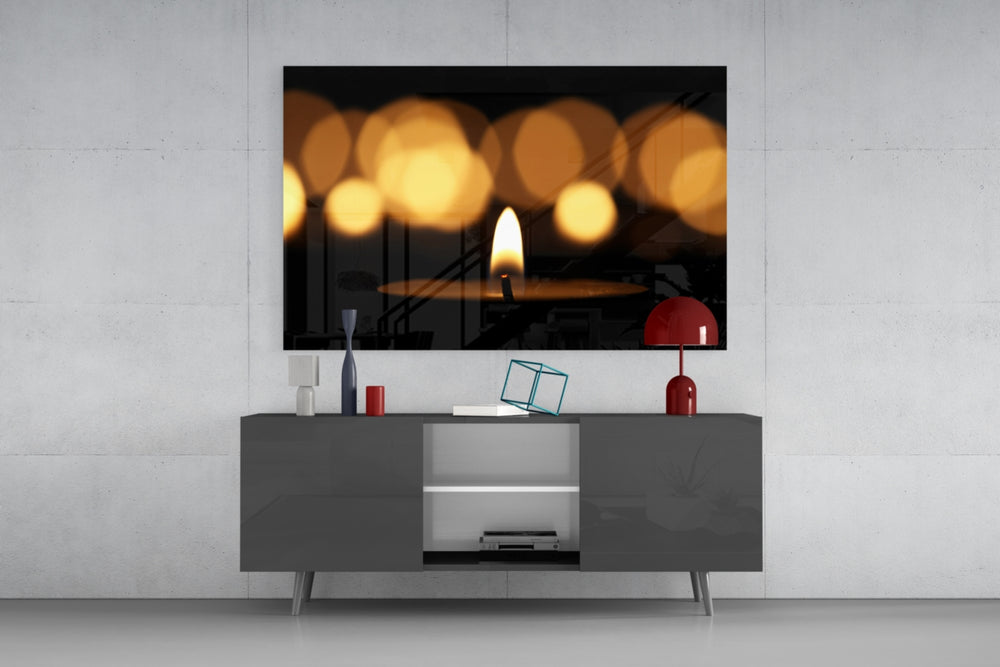 Candle panel catching warm light to reveal its bokeh glow