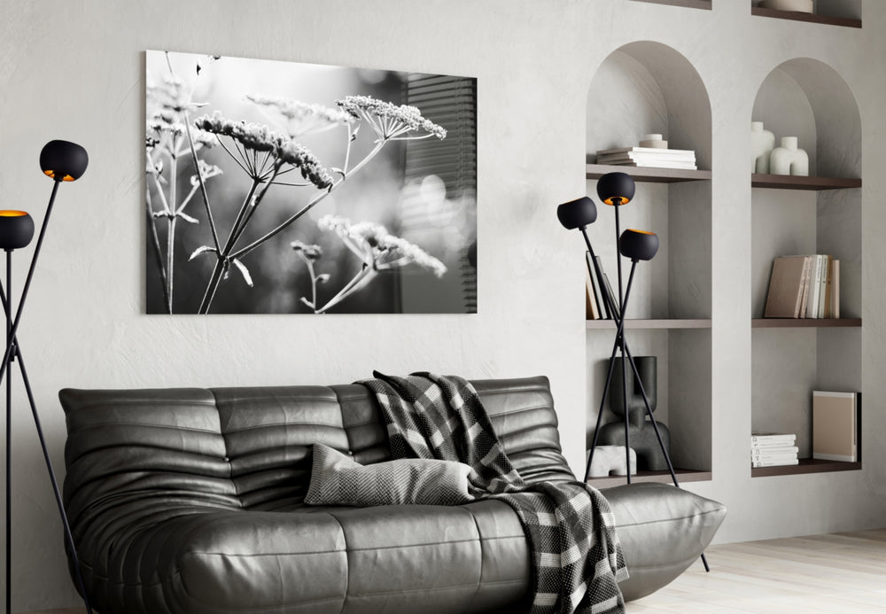 Flower glass wall art styled above a bed in a soft-romance bedroom
