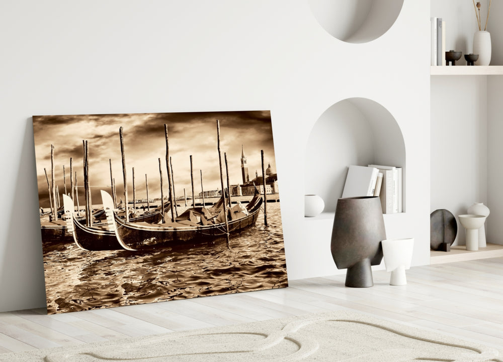 Close-up detail of the Venetian gondolas and San Giorgio tower in sepia