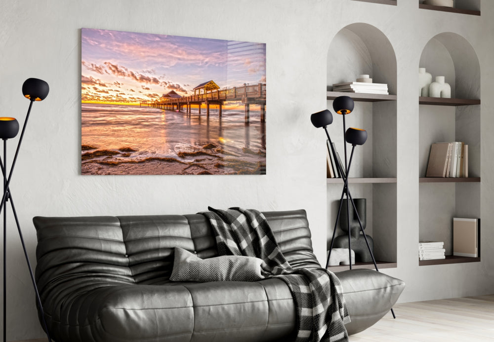 Dock glass wall art styled above a sofa in a seaside-retreat living room