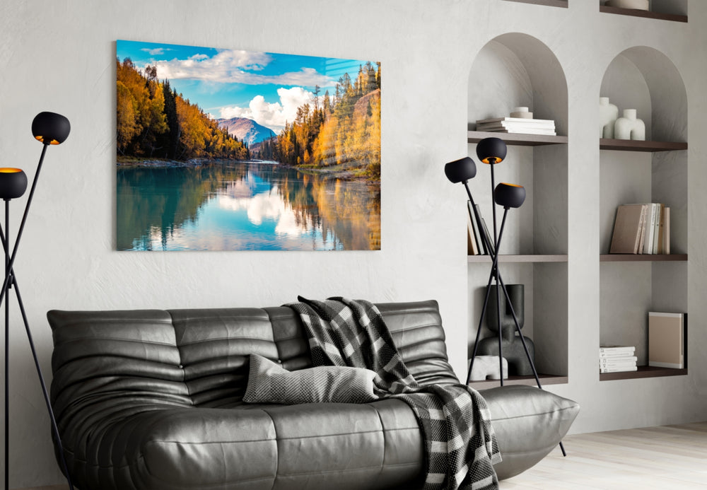Lake glass wall art styled above a sofa in a cabin-mood living room