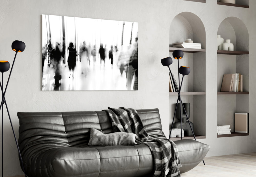 Crowds glass wall art styled above a desk in an urban home office