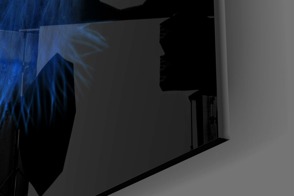 Blue Feather artwork anchoring a reading nook with minimalist palette