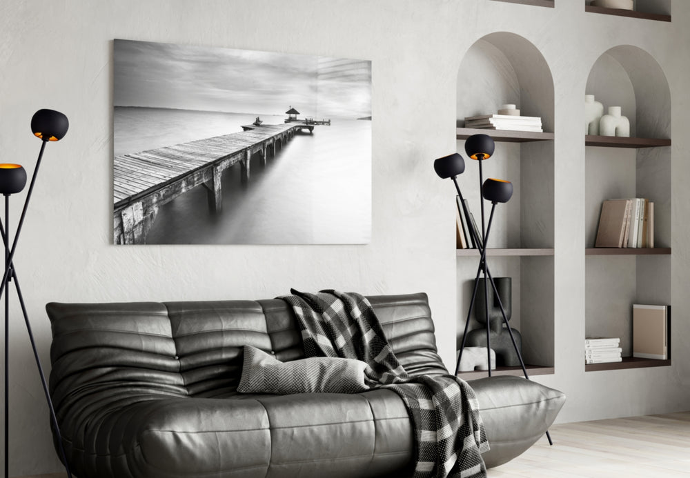 Dock glass wall art styled above a sofa in a contemplative living room
