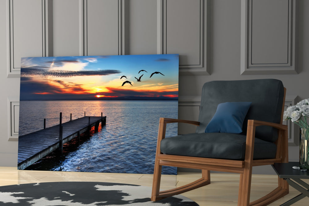 Dock glass print enhancing a dining area with fire-light energy
