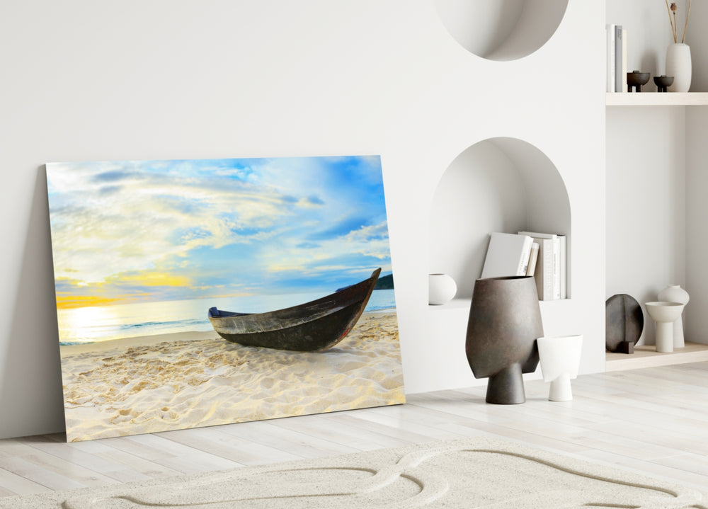 Close-up detail of the weathered wooden boat on white sand