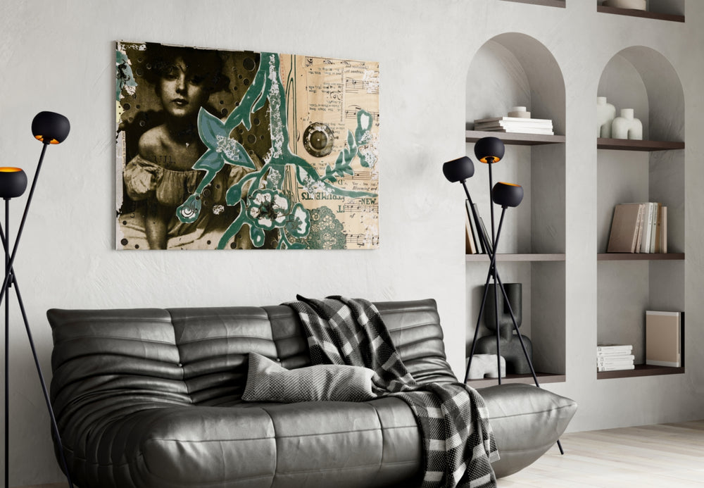 Abstract glass wall art styled above a desk in an antique-grace study