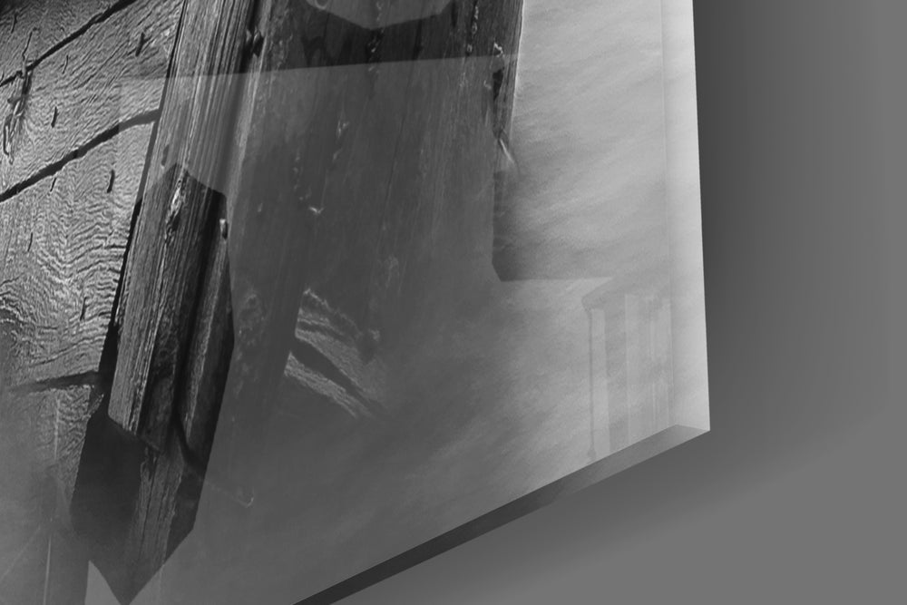 Shipwreck artwork anchoring a study with monochrome palette