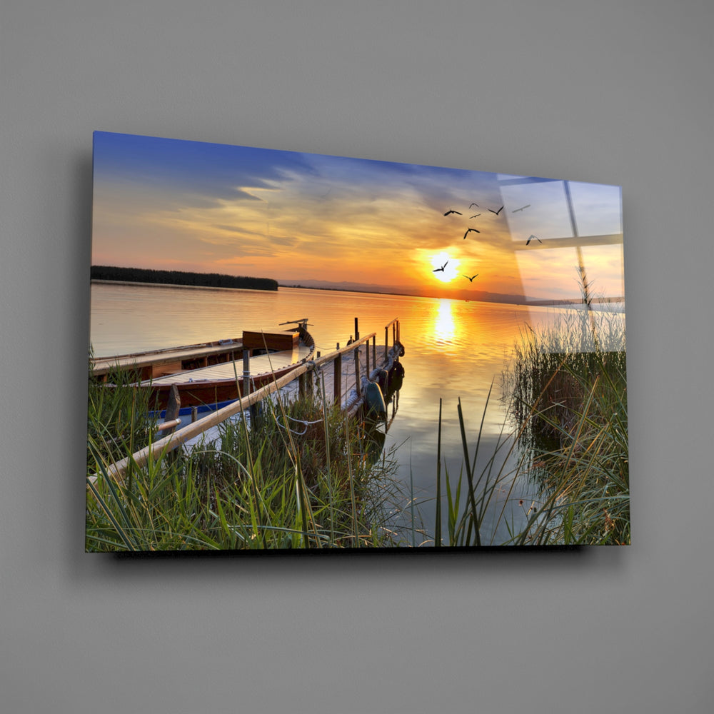 Golden-hour lake panel bringing retreat mood to a contemporary living space