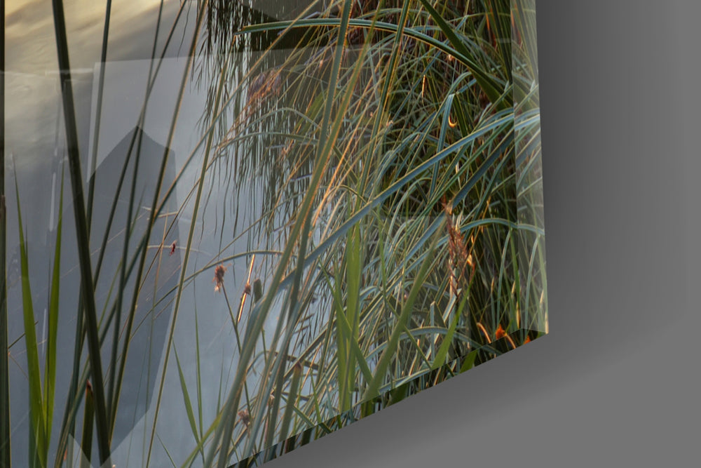 Sunset artwork anchoring a hallway with golden-hour palette