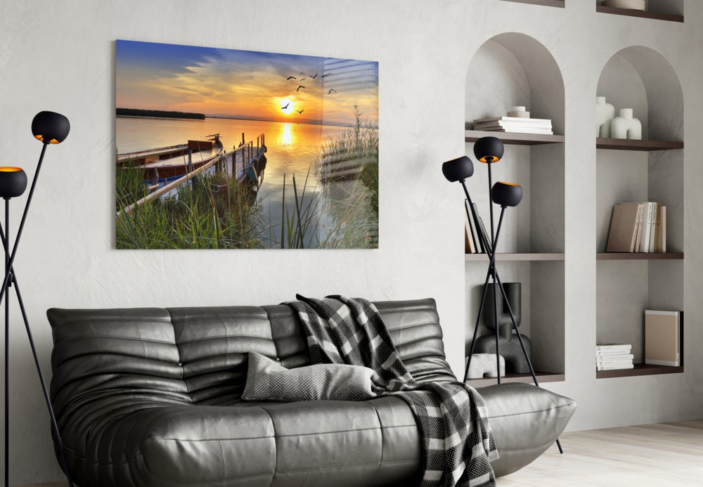 Sunset glass wall art styled above a bed in a retreat-mood bedroom