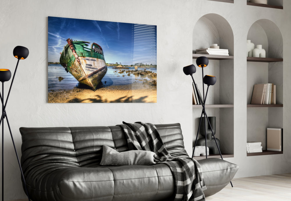 Shipwreck glass wall art styled above a sofa in a coastal-village living room