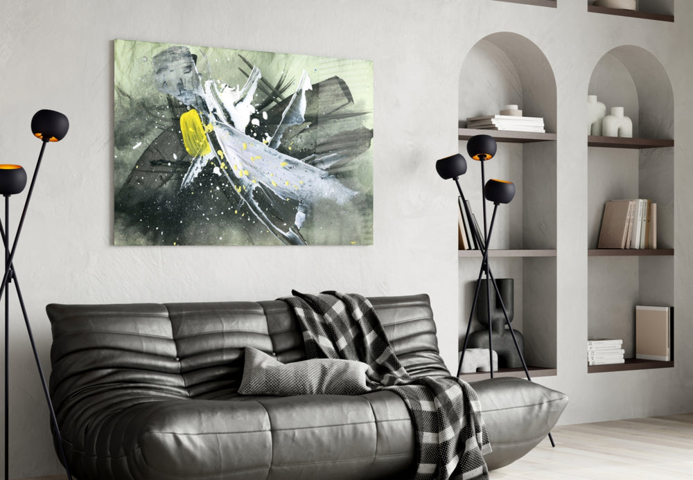 Abstract glass wall art styled above a sofa in a contemporary lounge