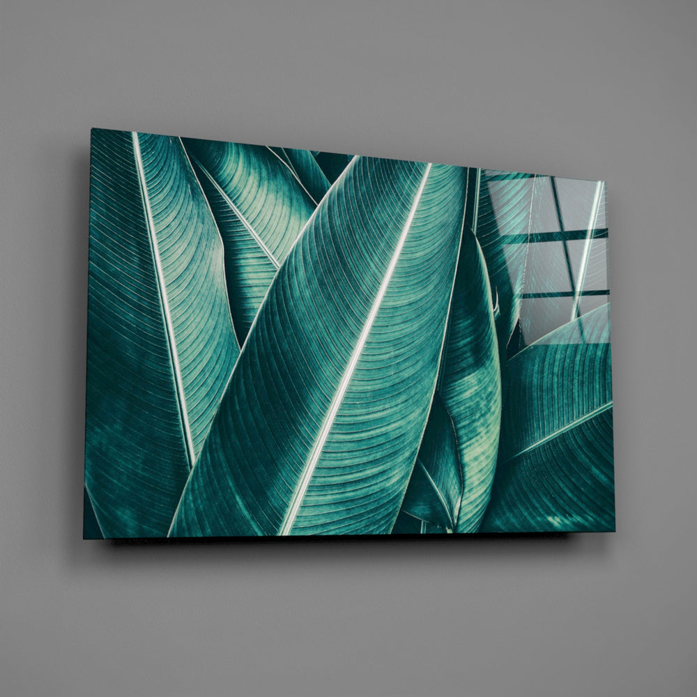 Teal tropical leaf panel bringing night-jungle calm to a contemporary living space