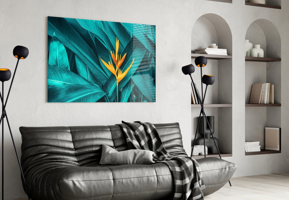 Tropical Leaf 3 glass wall art styled above a sofa in a statement-color living room