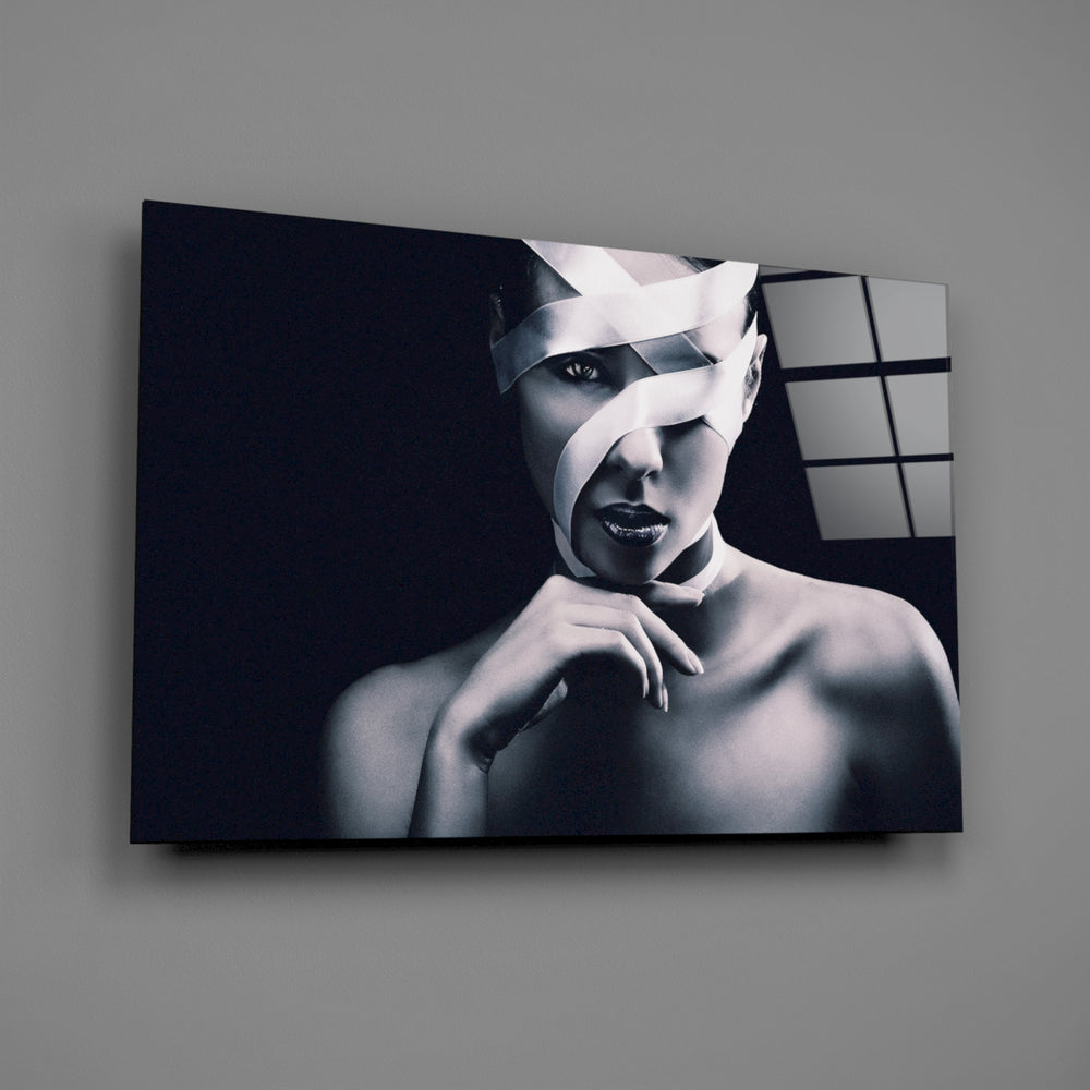 Ribbon-wrapped portrait bringing conceptual drama to a contemporary living space