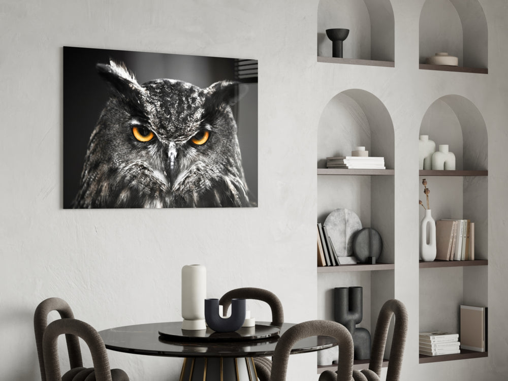 Owl glass wall art styled above a desk in a literary-taste study