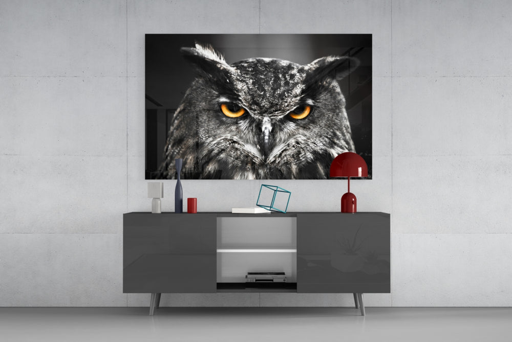 Owl artwork anchoring a study with selective-color palette