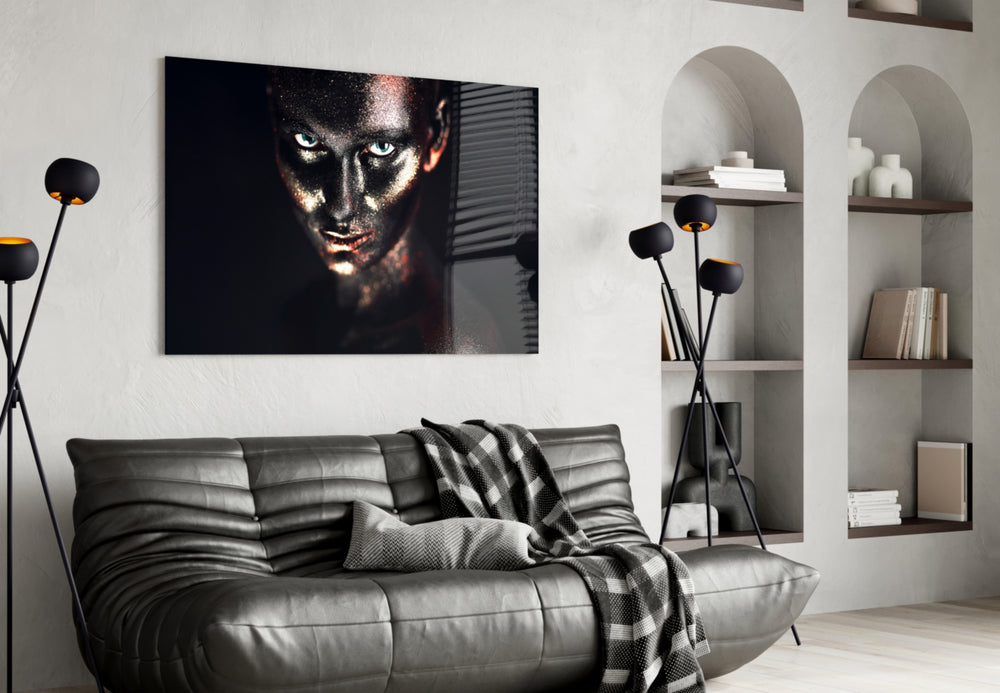 Woman glass wall art styled above a bed in an editorial bedroom