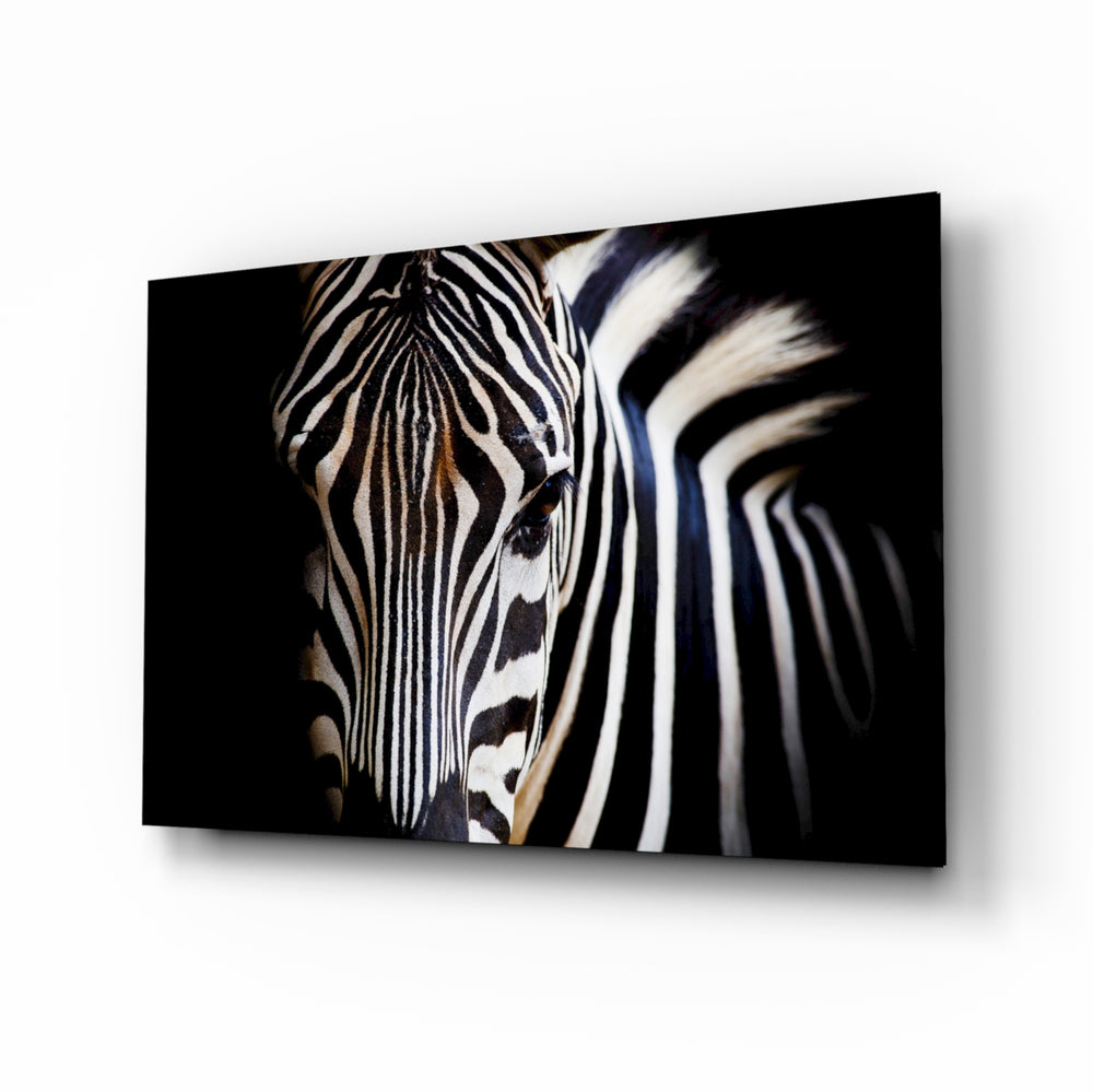Zebra glass wall art displayed above a console in a designer interior