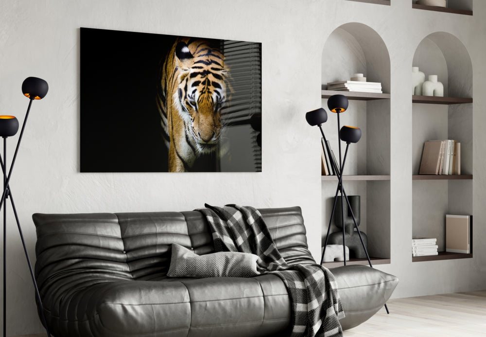 Tiger glass wall art styled above a sofa in a gentleman's-lounge living room