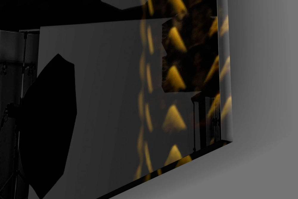 Designer-collection artwork in a luxe lounge with leather seating