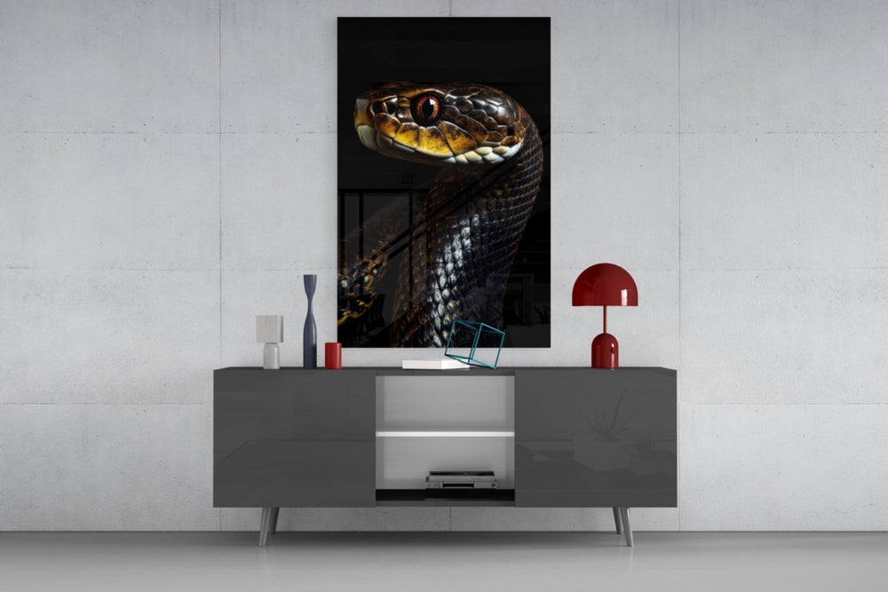 Golden-Eyed Black Snake glass wall art catching light to reveal its scale gleam