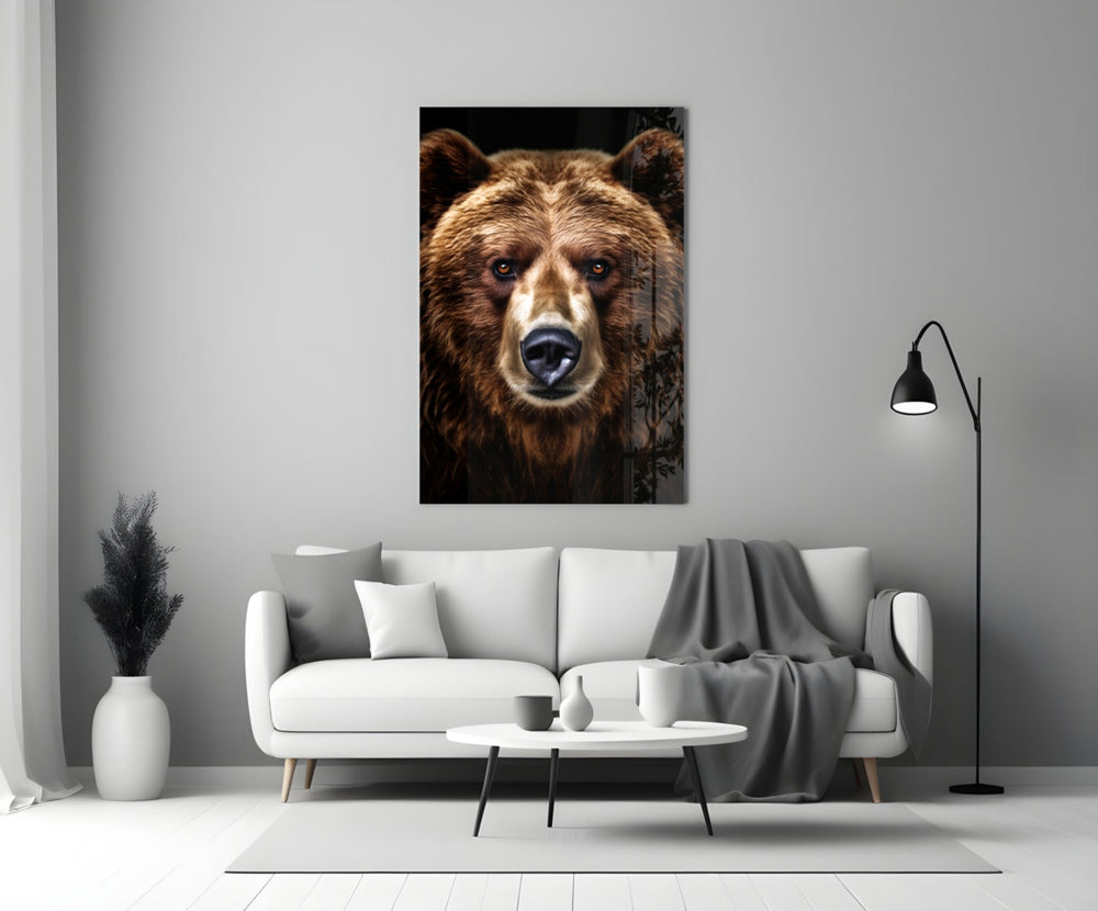 Close-up detail of the grizzly bear and amber eyes behind glass