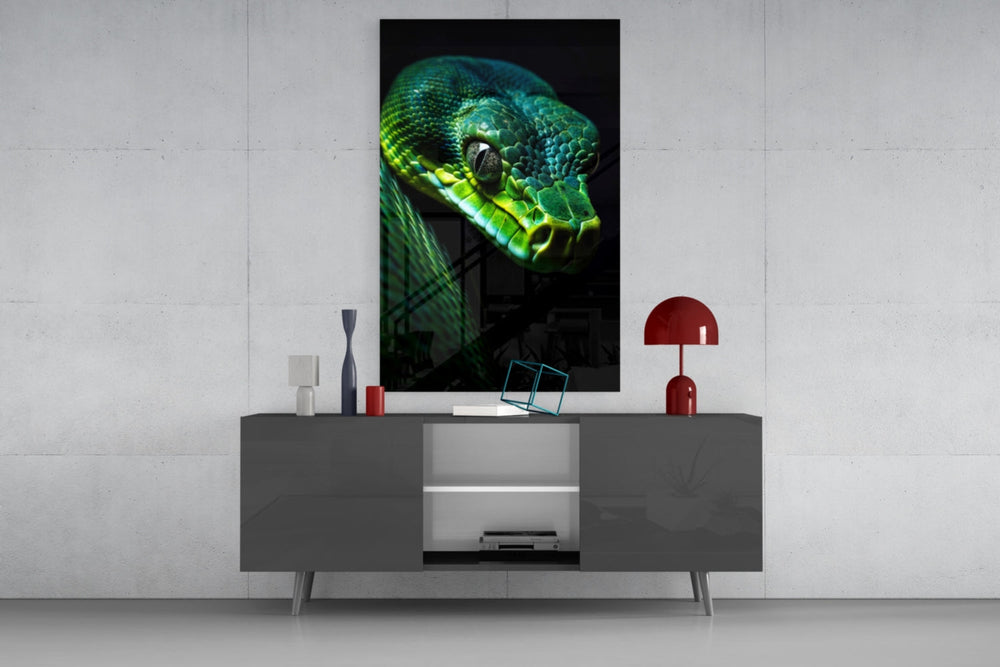 Emerald Green Viper glass wall art catching light to reveal its scale gleam