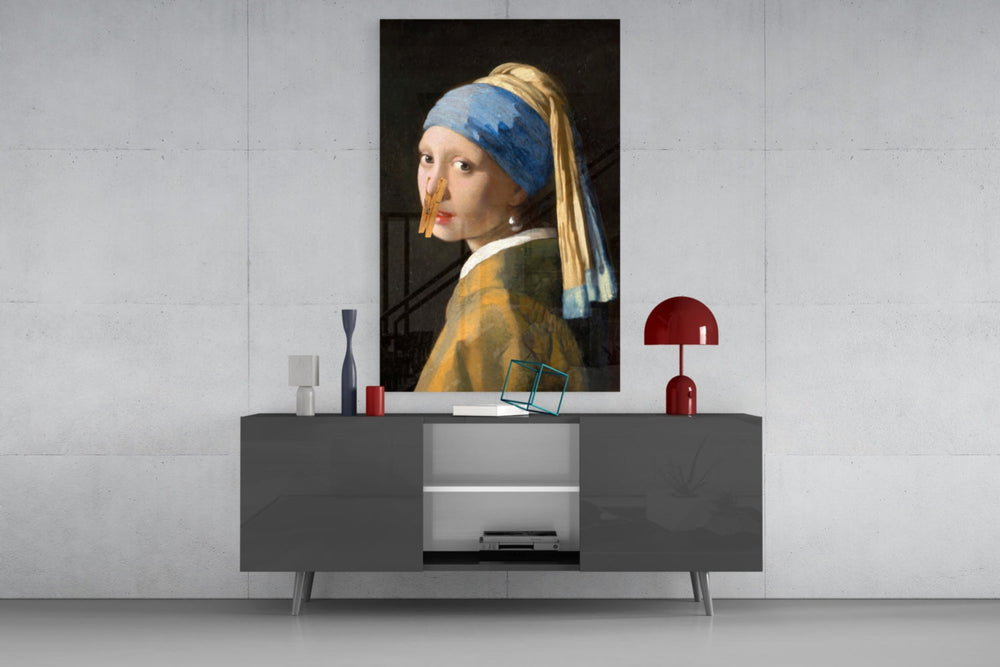 Girl Stuck on Clothespin glass wall art catching light to reveal its painted detail